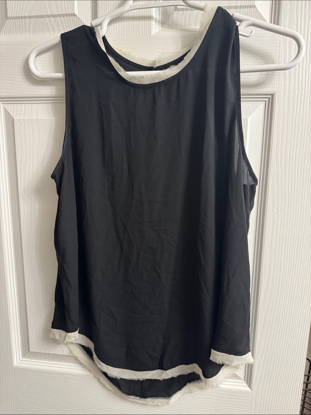 Black Sleeveless Tank Top with Tattered White Trim